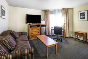 Suite, 1 King Bed with Sofa bed, Non Smoking | Premium bedding, down comforters, pillowtop beds, in-room safe