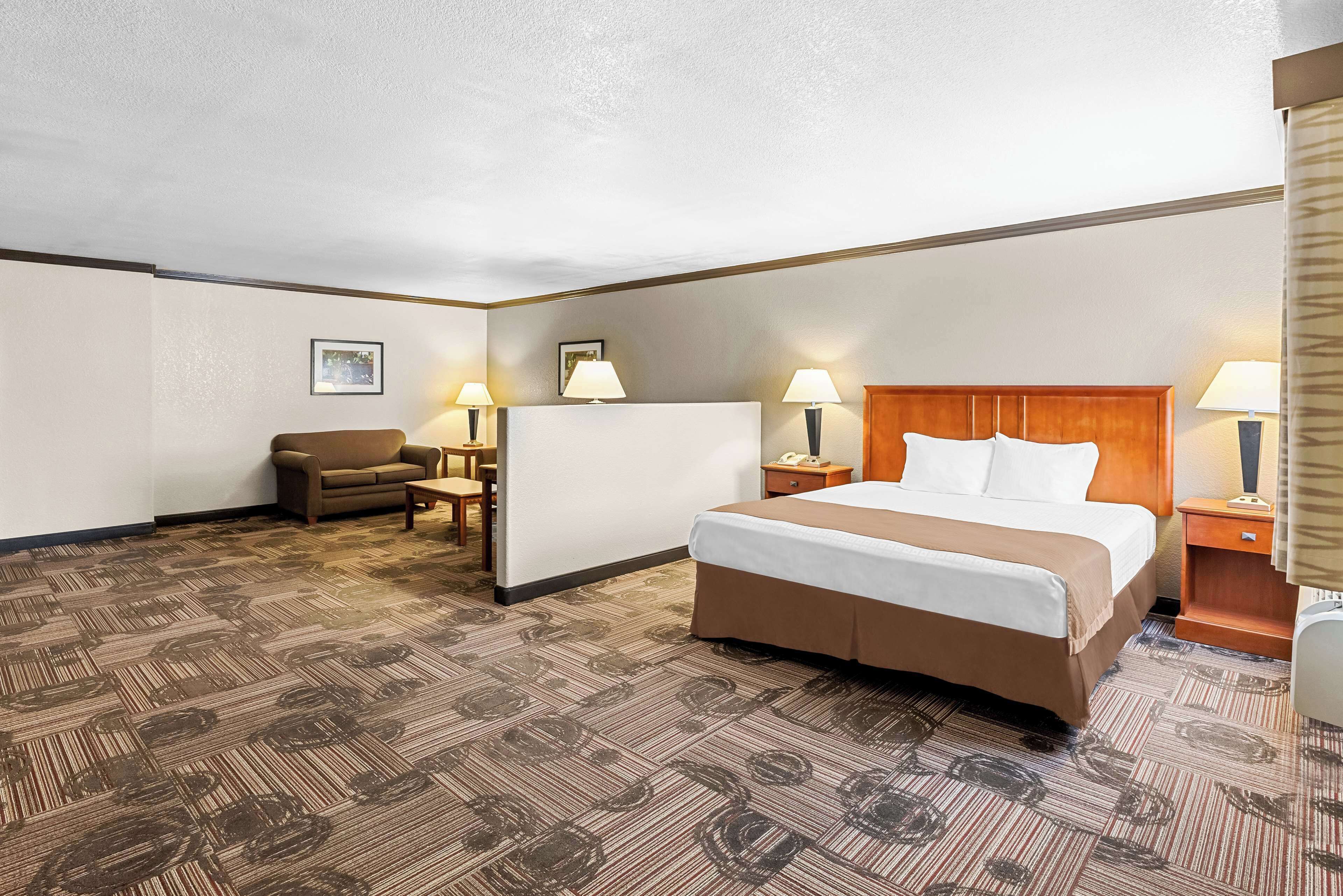 suite, 1 king bed, non smoking, refrigerator & microwave (oversized room;with sofabed) | desk, laptop workspace, free wifi, bed sheets