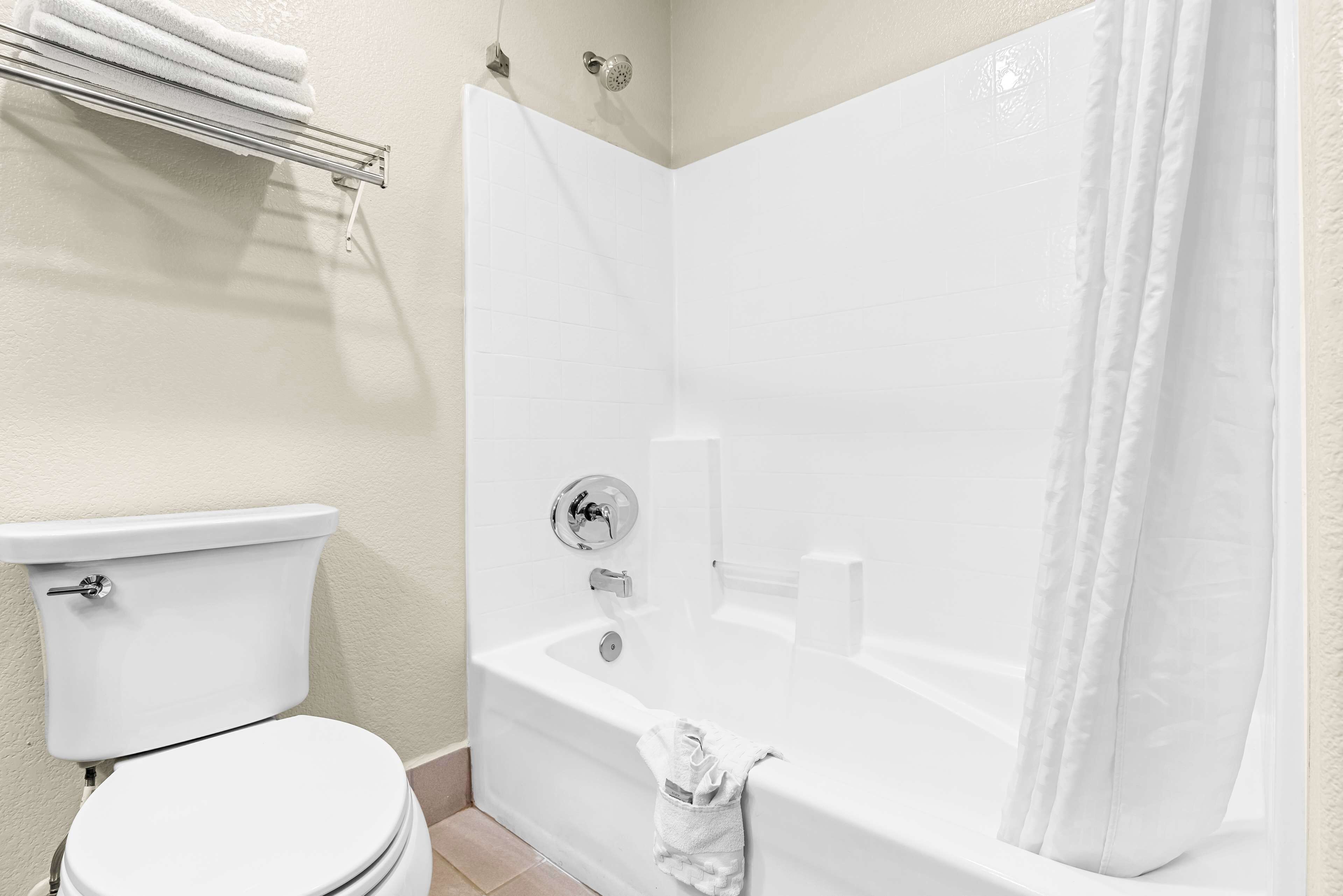 combined shower/bathtub, free toiletries, hair dryer, towels