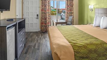 Chambre Standard, 1 grand lit | Coffres-forts dans les chambres, bureau, Wi-Fi gratuit, draps fournis