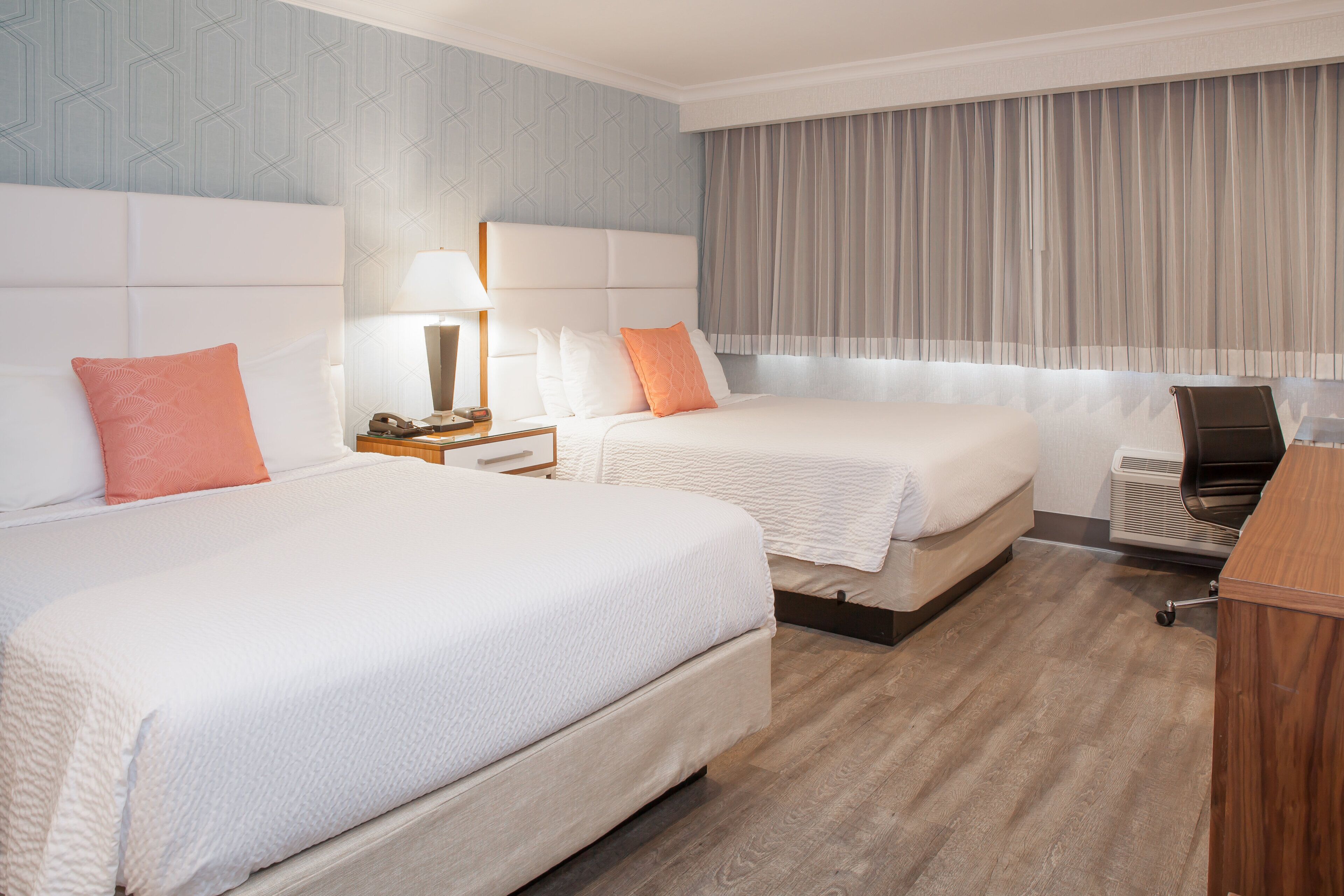 standard room, 2 queen beds, non smoking | in-room safe, individually decorated, individually furnished, desk