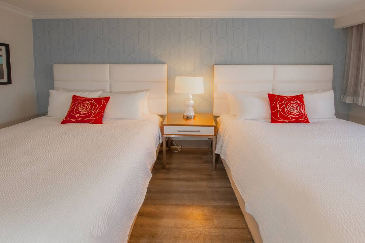 Room, 1 Queen 1 Full ,Accessible, Non Smoking | In-room safe, desk, laptop workspace, blackout drapes