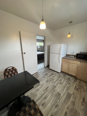 Standard Studio Suite, 1 King Bed | Private kitchenette | Mini-fridge, microwave, coffee/tea maker