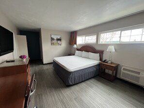 Standard Studio Suite, 1 King Bed | Select Comfort beds, desk, laptop workspace, iron/ironing board