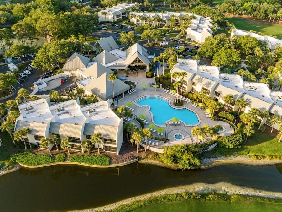 Outdoor pool, open 7:00 AM to 11:00 PM, pool umbrellas, sun loungers