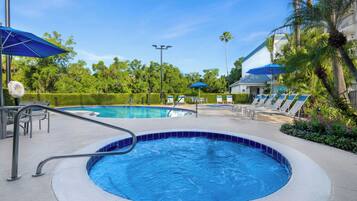 Outdoor pool, a heated pool, pool umbrellas, sun loungers
