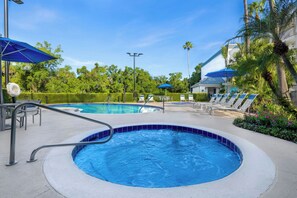 Outdoor pool, a heated pool, pool umbrellas, pool loungers - Marriott's Imperial Palm Villas (Orlando)