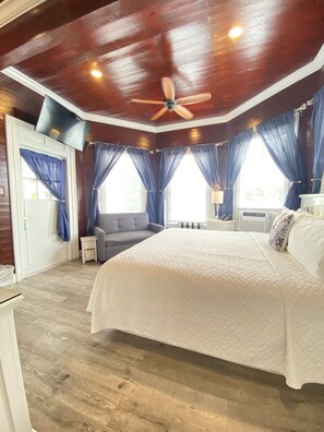 Deluxe King Room (Not Pet Friendly) | Bed sheets, alarm clocks - The Palms Hotel (Key West)