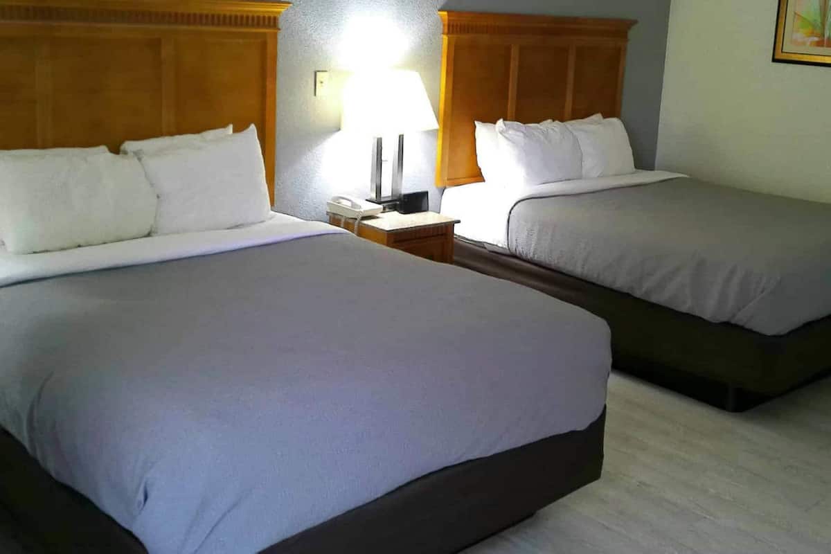 Room, 2 Queen Beds, Non Smoking (Upgrade) | Premium bedding, down duvets, desk, blackout curtains