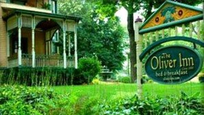 A sign for The Oliver Inn bed & breakfast.