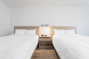 Room, 2 Queen Beds, Non Smoking | Desk, laptop workspace, blackout curtains, iron/ironing board