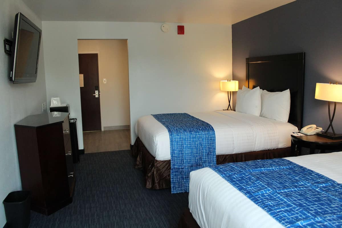 Room, 2 Queen Beds, Non Smoking | Desk, laptop workspace, blackout drapes, iron/ironing board
