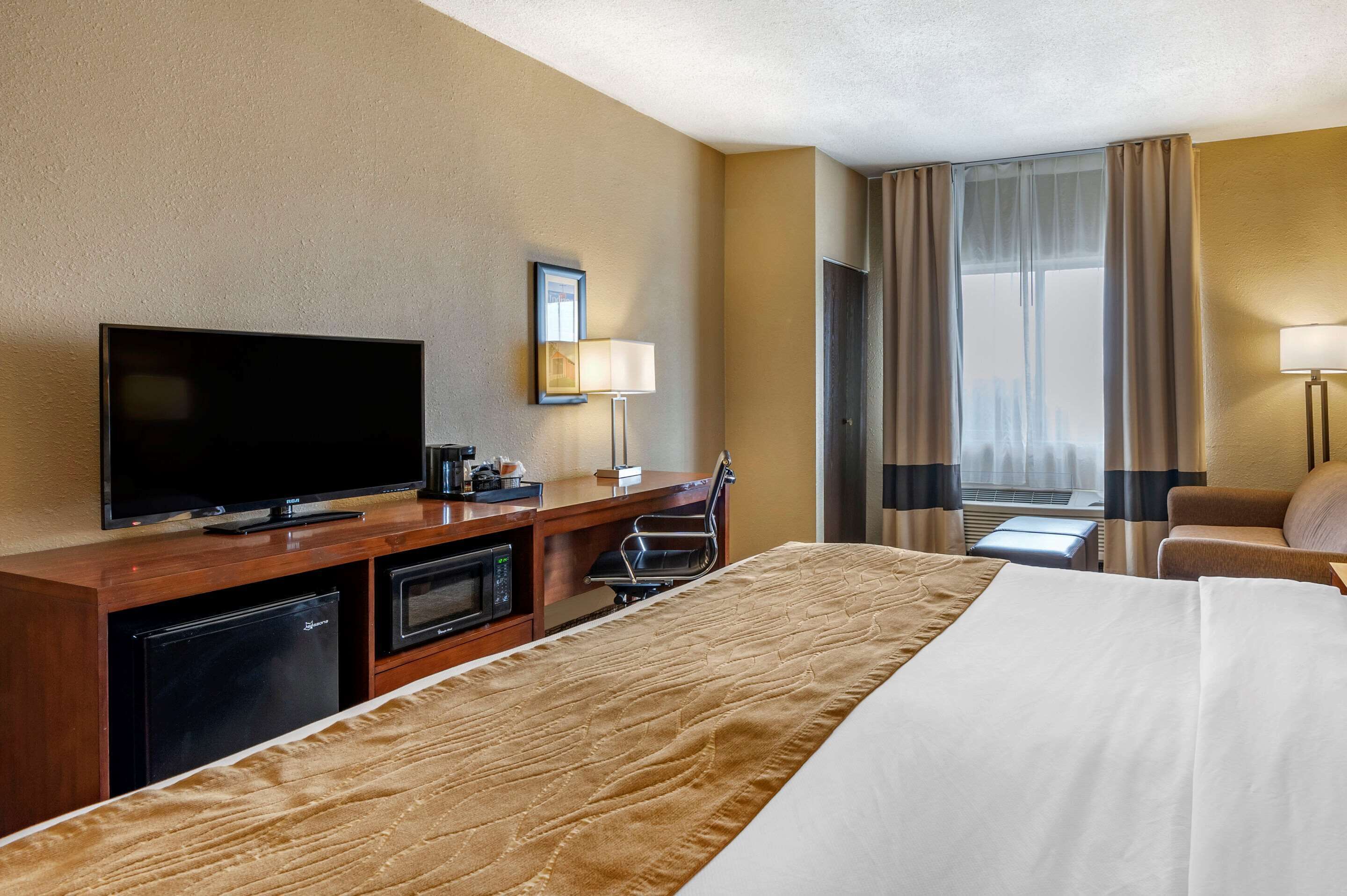 premium bedding, pillow-top beds, desk, laptop workspace