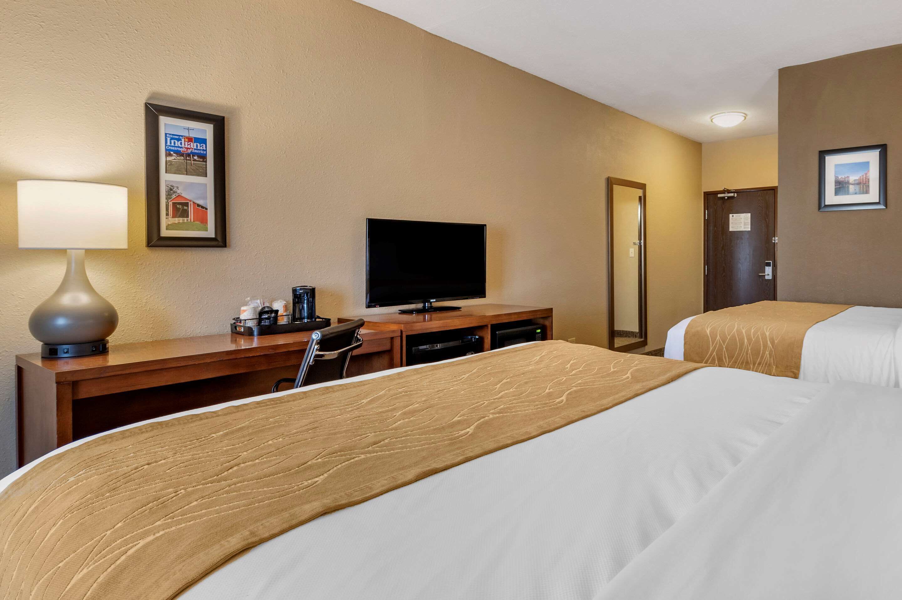 premium bedding, pillow-top beds, desk, laptop workspace