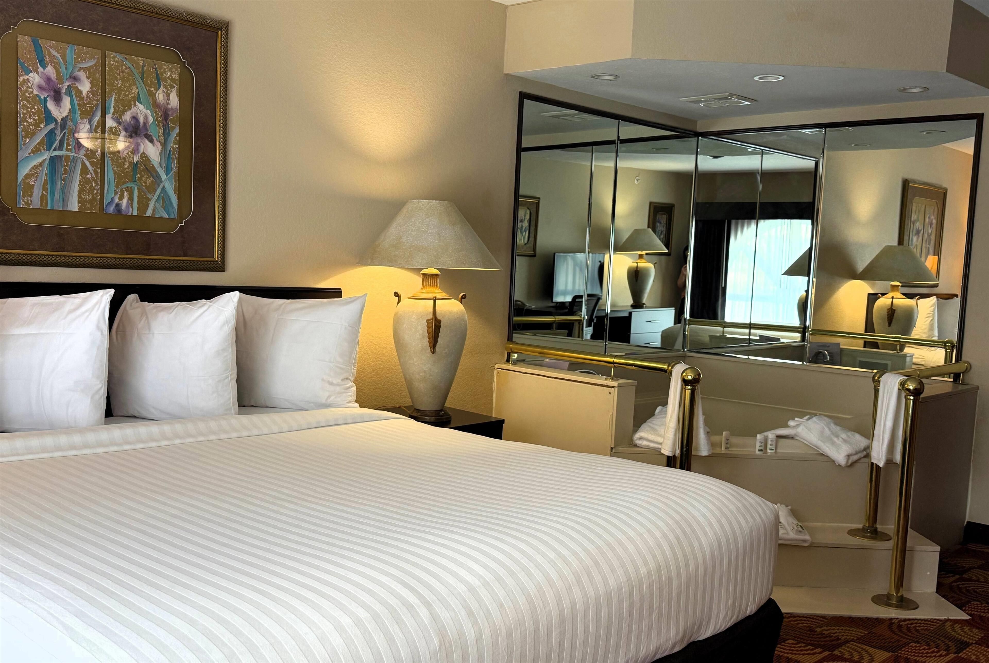 Executive Suite, 1 King Bed, Non Smoking, Jetted Tub (2 Rooms) | Hypo-allergenic bedding, individually decorated, individually furnished