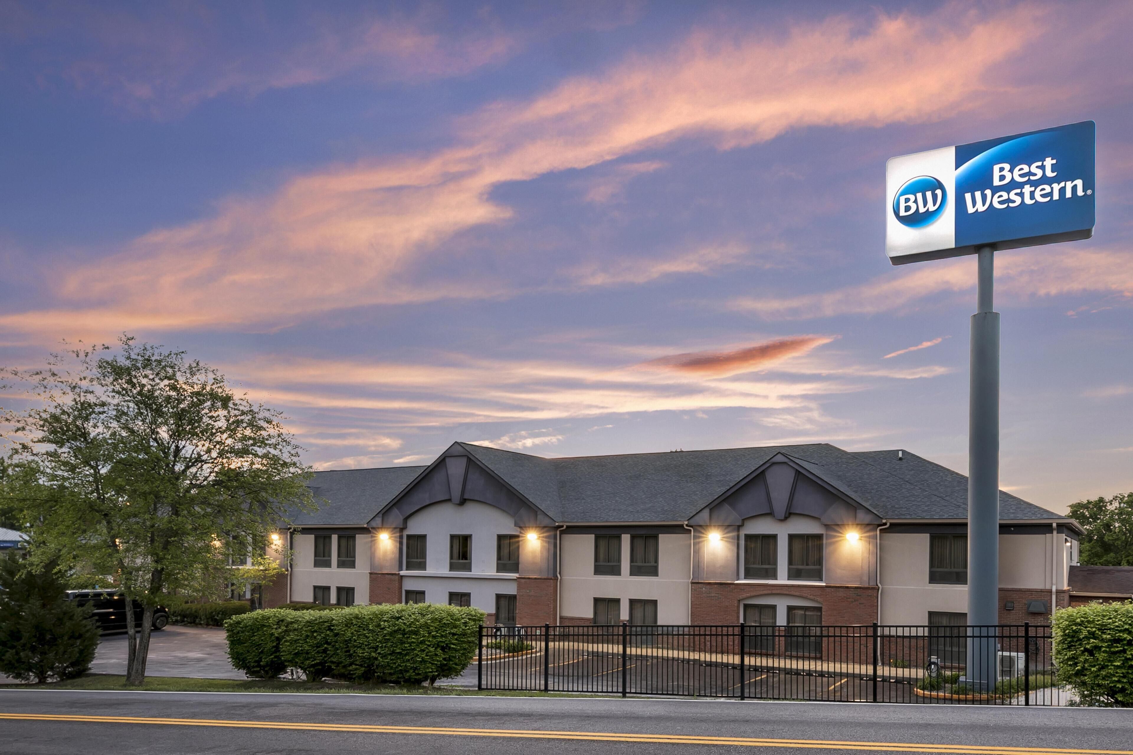 A Best Western hotel with a brick facade, multiple windows, and a parking lot.