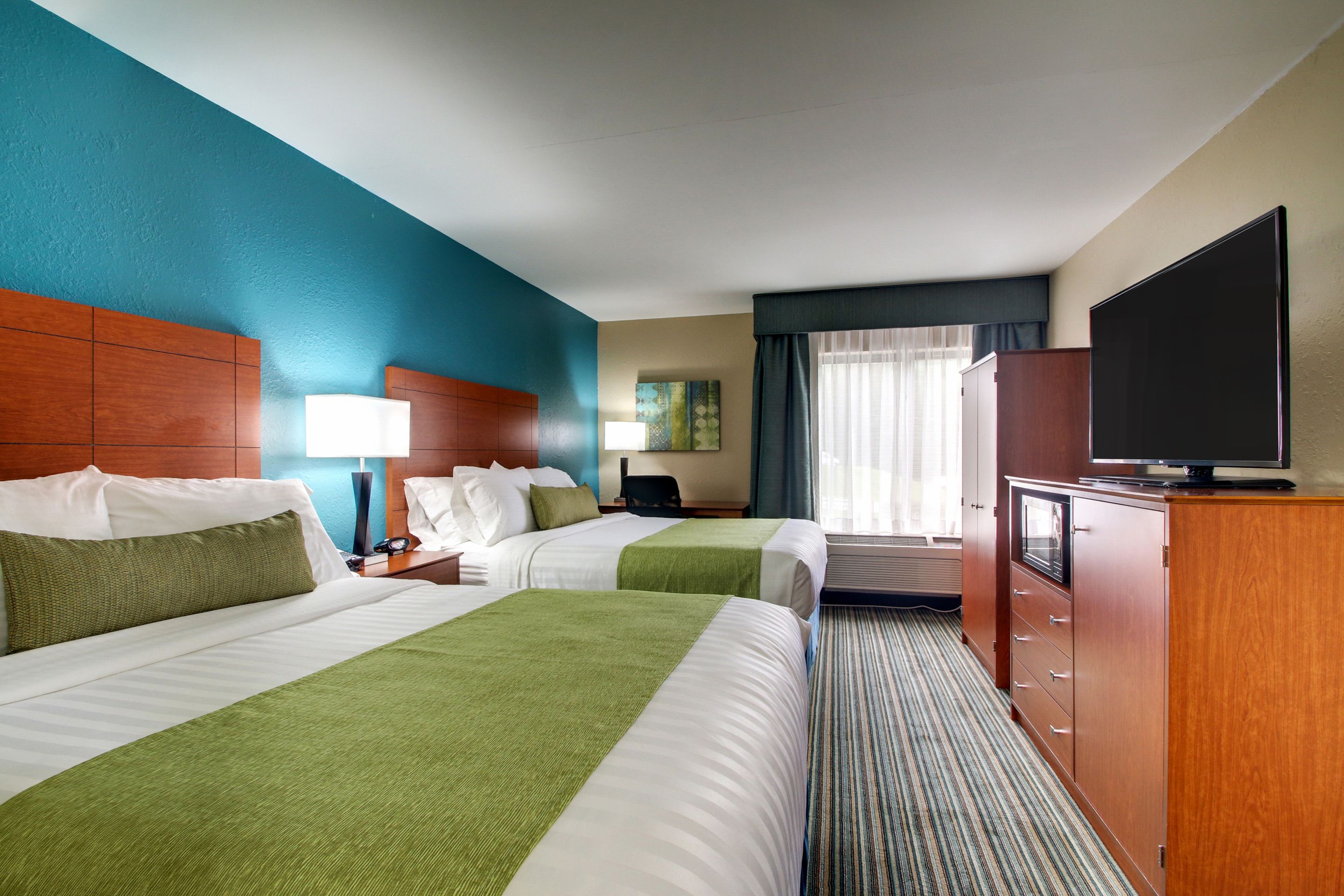 standard room, 2 queen beds, non smoking, microwave | pillow-top beds, desk, laptop workspace, blackout curtains