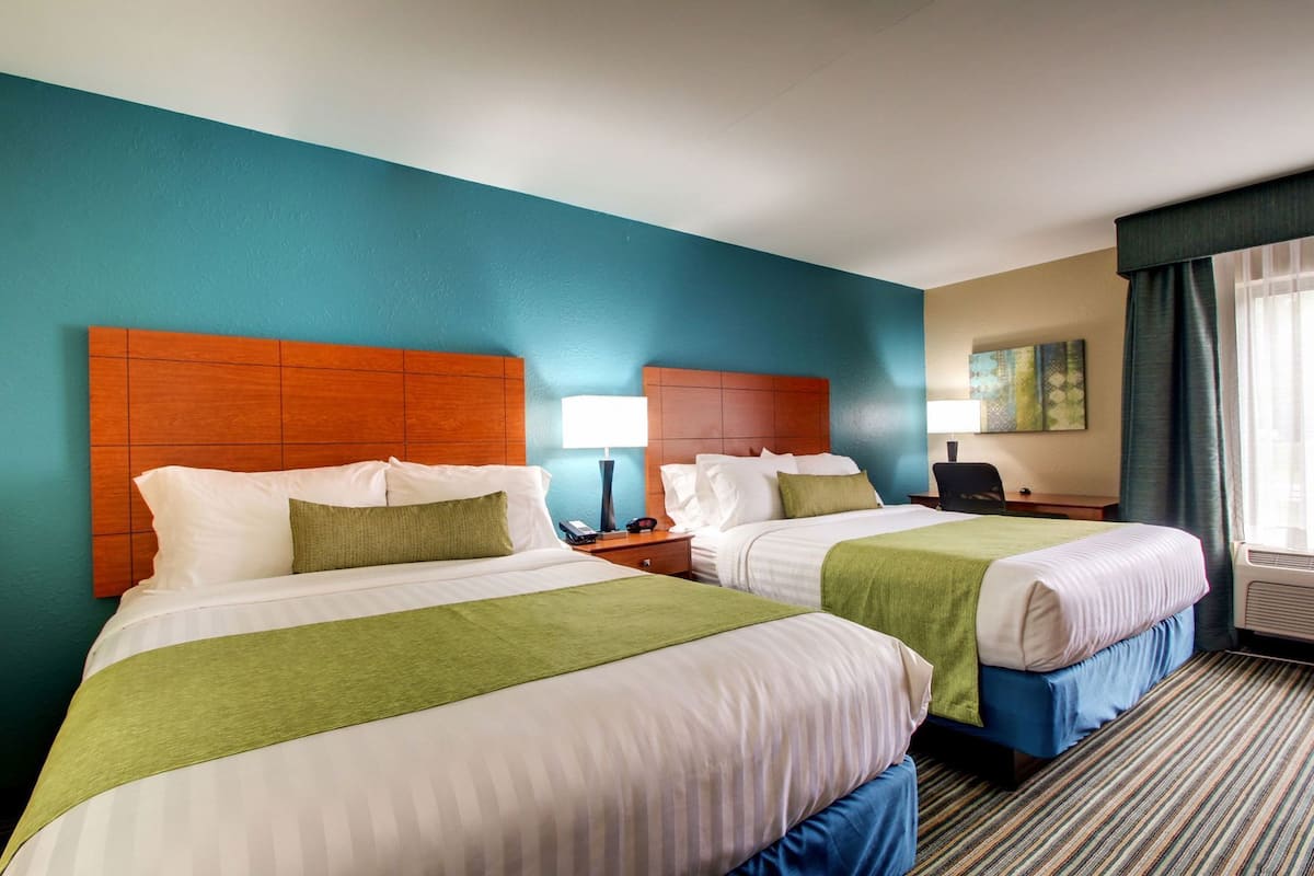 Pillowtop beds, desk, laptop workspace, blackout drapes