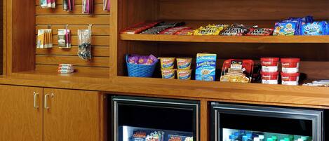 A snack and beverage display with various brands and products.