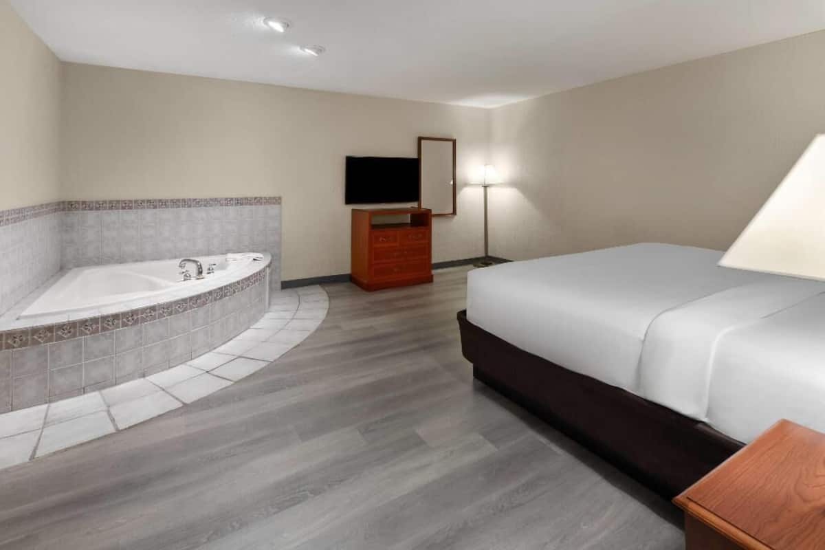 Pillow-top beds, desk, laptop workspace, blackout curtains