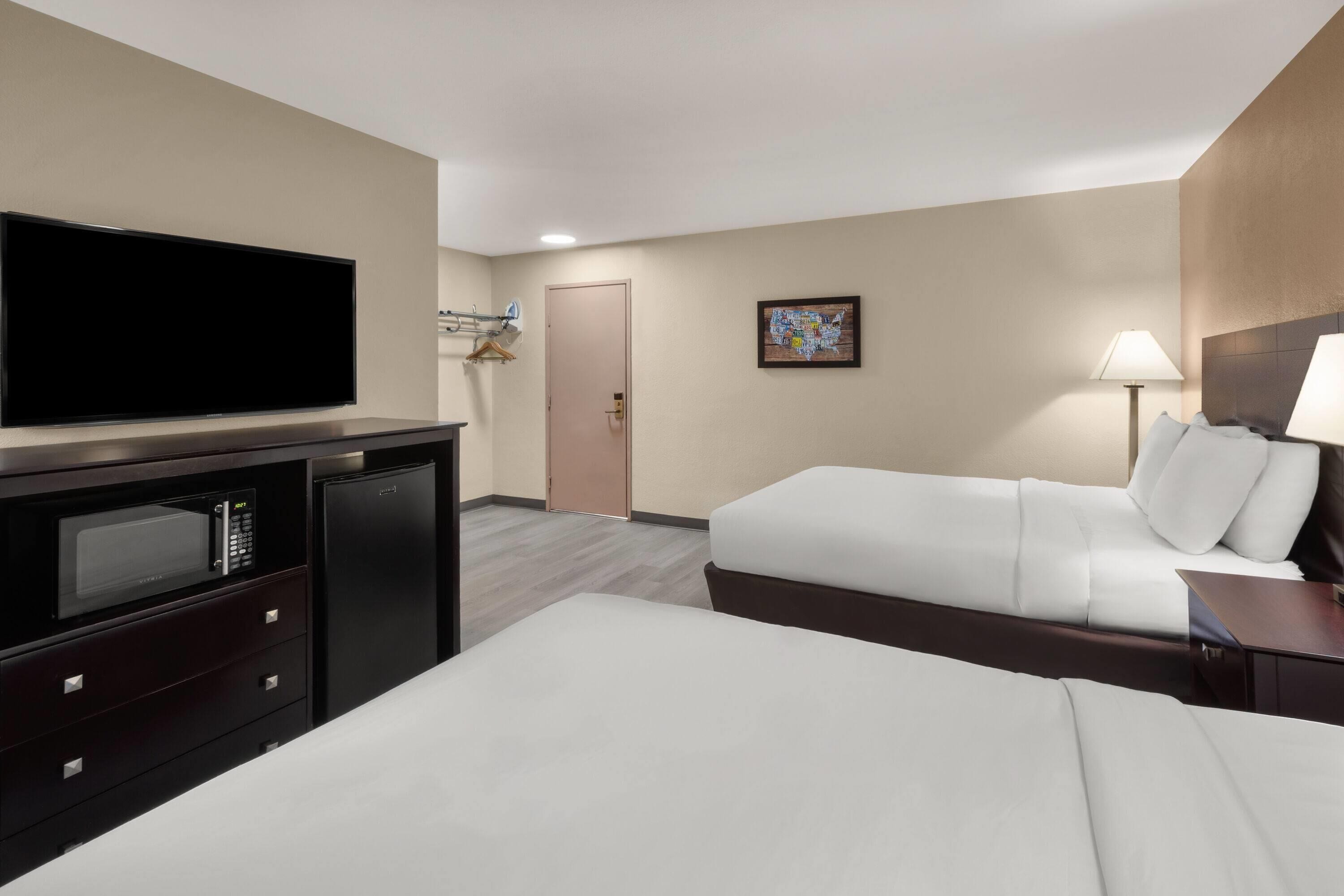 Room, 2 Queen Beds, Non Smoking (Pet Friendly) | Pillowtop beds, desk, laptop workspace, blackout drapes
