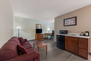 Suite, 1 King Bed, Non Smoking | Pillowtop beds, desk, laptop workspace, blackout drapes