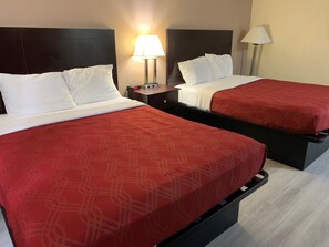 Pillow-top beds, desk, laptop workspace, blackout curtains