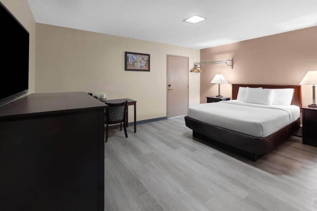 Pillow-top beds, desk, laptop workspace, blackout curtains