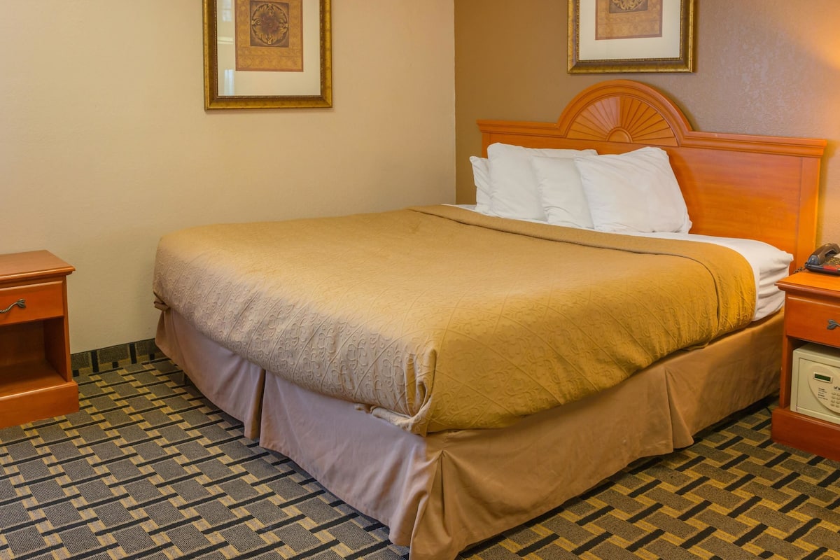 Down comforters, desk, laptop workspace, blackout drapes