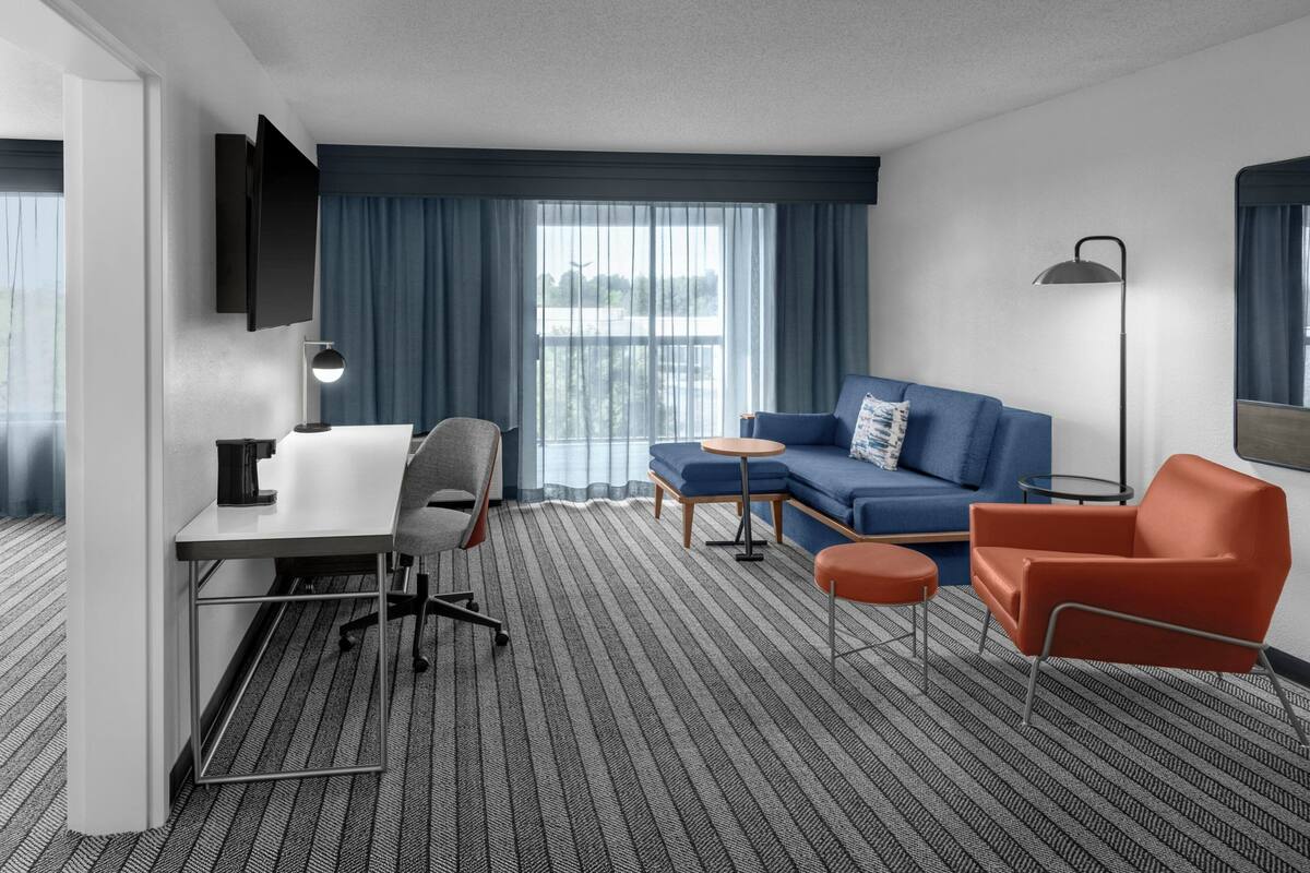 Suite, 1 Bedroom, Balcony | Living room | TV