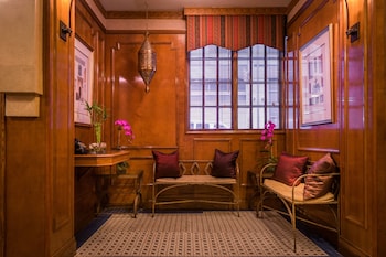 Sitting area in hotel lobby at Casablanca Hotel by Library Hotel Collection