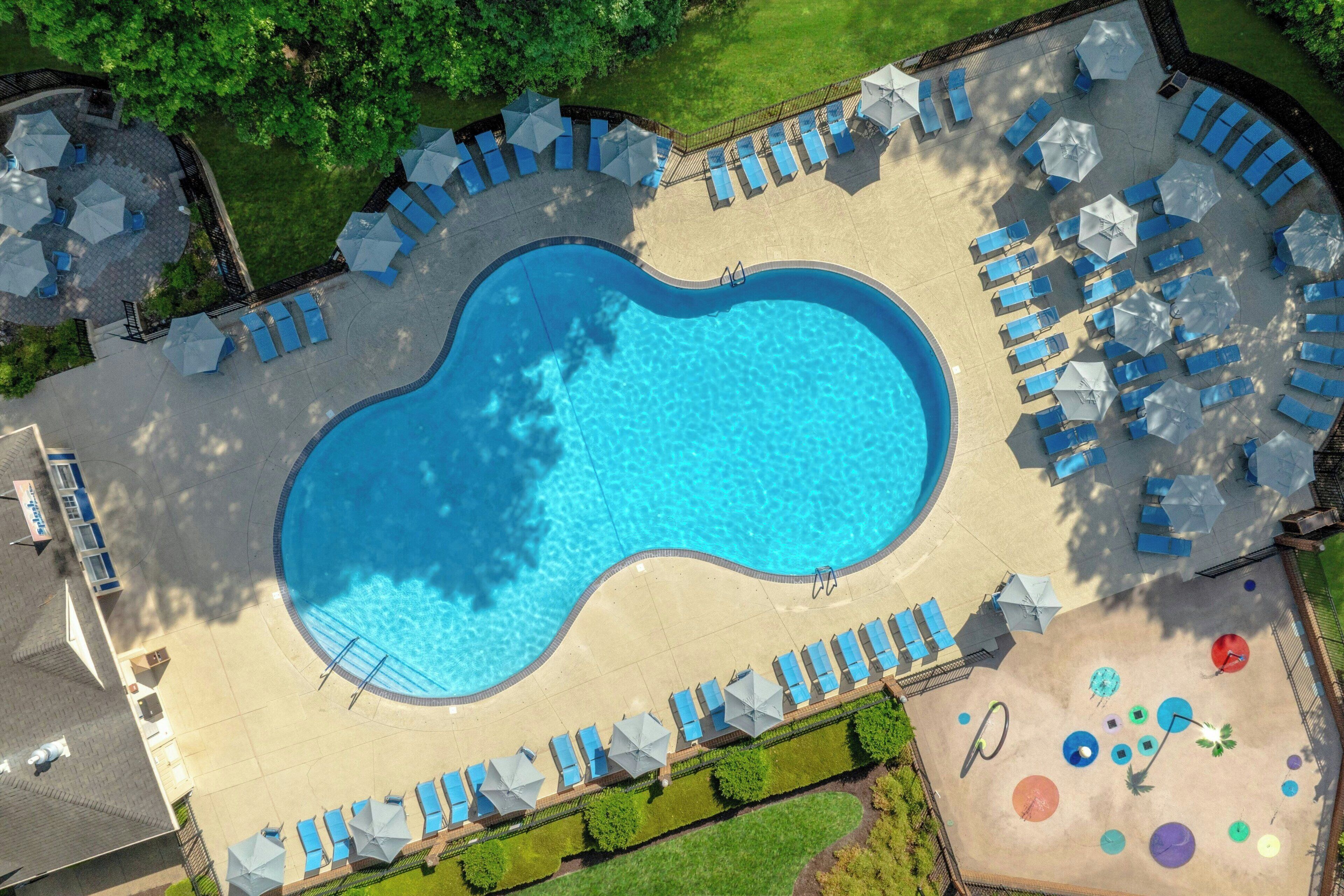 Indoor pool, 2 outdoor pools, open 7 AM to 11 PM, pool umbrellas