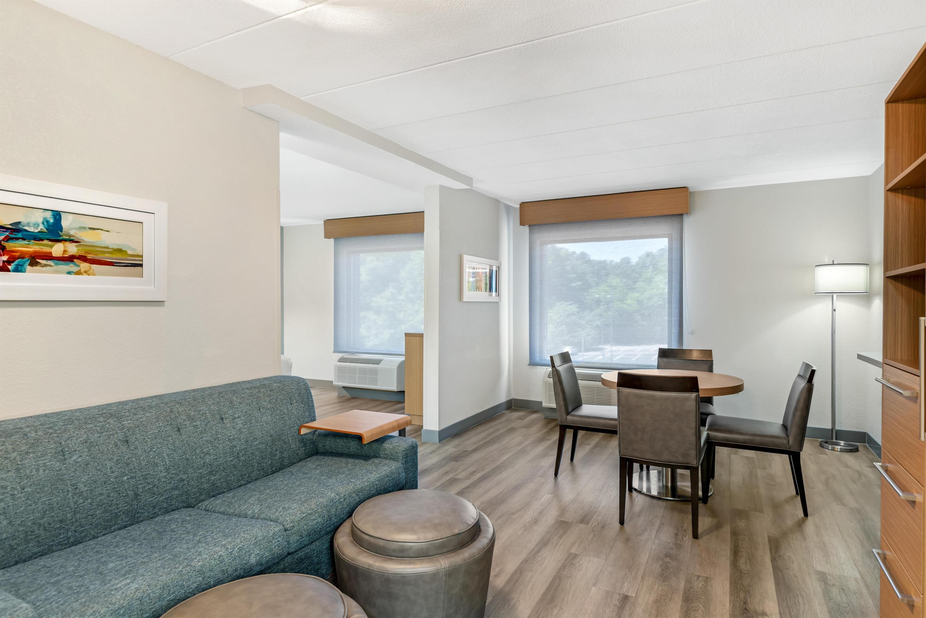 Suite, 1 King Bed, Non Smoking, Refrigerator & Microwave (with Sofabed) | Desk, laptop workspace, blackout curtains, iron/ironing board