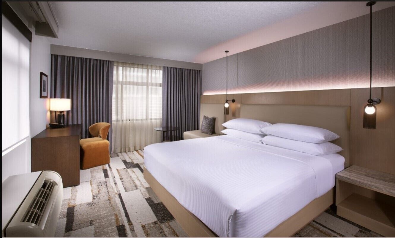 Signature kamer, 1 kingsize bed, hoek | 1 slaapkamer, luxe beddengoed, een kluis op de kamer