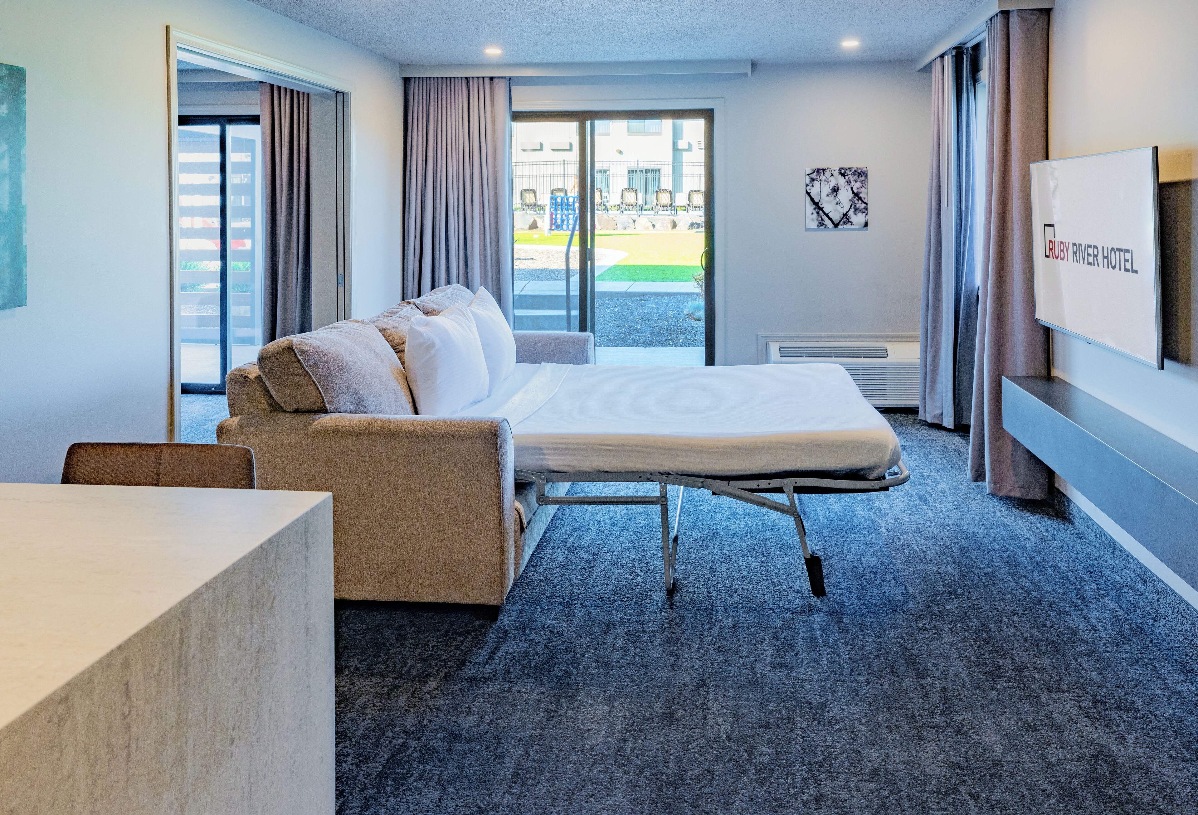 family suite | premium bedding, desk, laptop workspace, blackout curtains