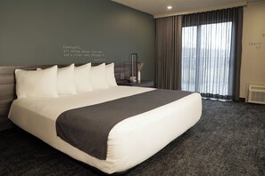 Premium bedding, desk, laptop workspace, blackout drapes - Ruby River Hotel Downtown Spokane (Spokane)