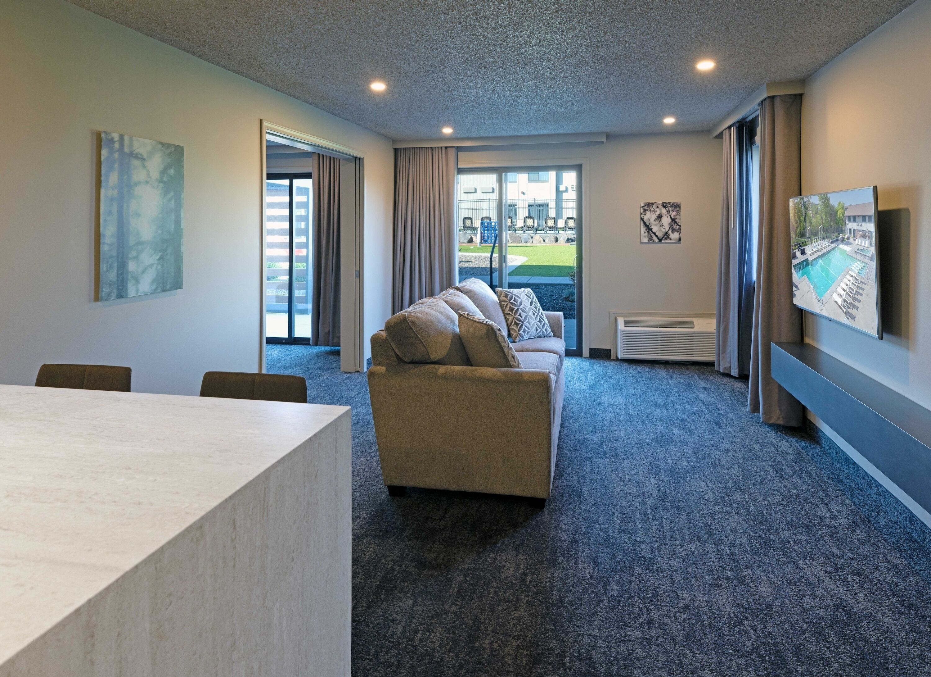 family suite | premium bedding, desk, laptop workspace, blackout curtains