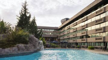 Seasonal outdoor pool, pool umbrellas, pool loungers
