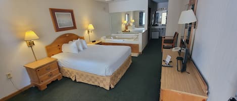 Deluxe Room, 1 Queen Bed, Jetted Tub | Pillowtop beds, iron/ironing board, rollaway beds, free WiFi
