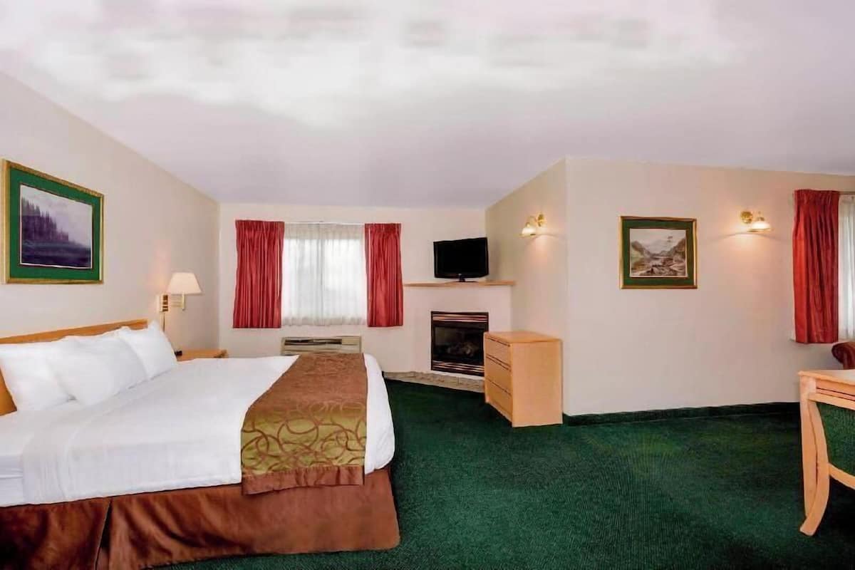 Premium bedding, blackout drapes, iron/ironing board, cribs/infant beds