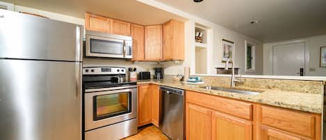 Mini-fridge, microwave, oven, stovetop
