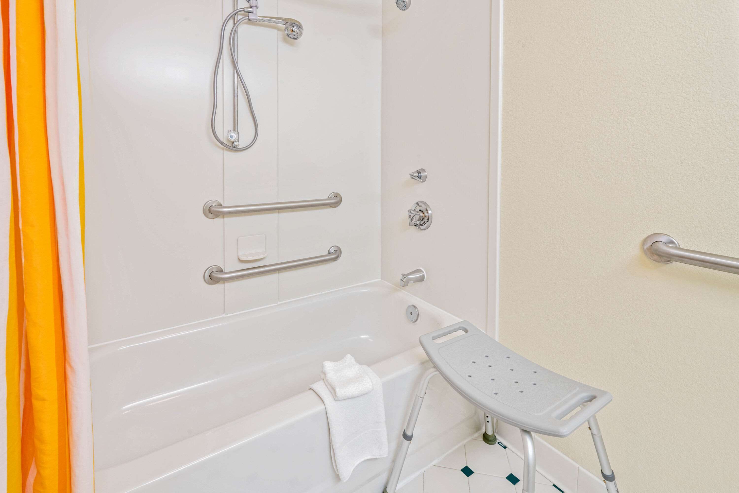 combined shower/bathtub, free toiletries, hair dryer, towels