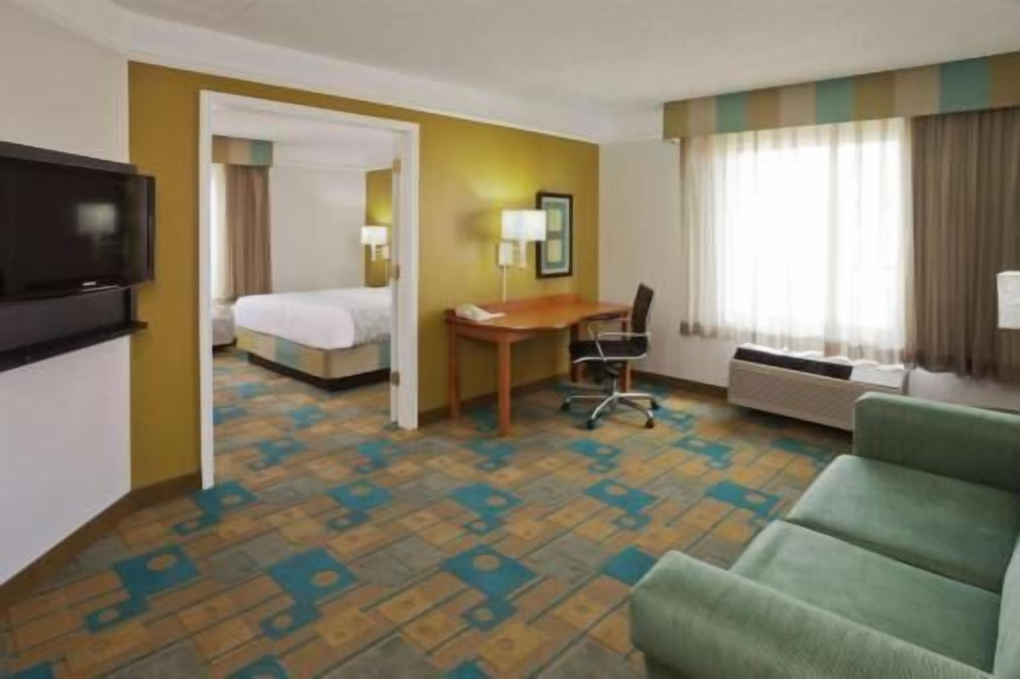Premium bedding, desk, blackout curtains, iron/ironing board