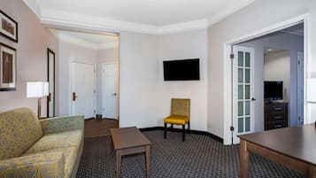 Premium bedding, desk, laptop workspace, blackout curtains