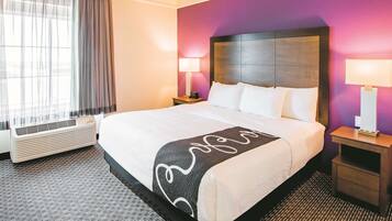 Suite, 1 King Bed, Non Smoking | Premium bedding, desk, laptop workspace, iron/ironing board