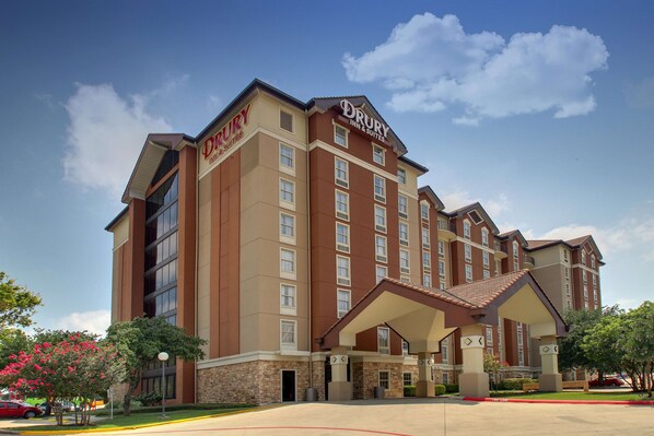 A Drury Inn & Suites hotel with a modern design, featuring multiple floors and a prominent entrance. - Drury Inn & Suites San Antonio Northwest Medical Center (San Antonio)