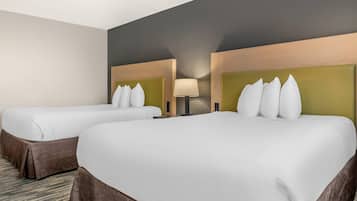 Premium bedding, down comforters, pillowtop beds, in-room safe