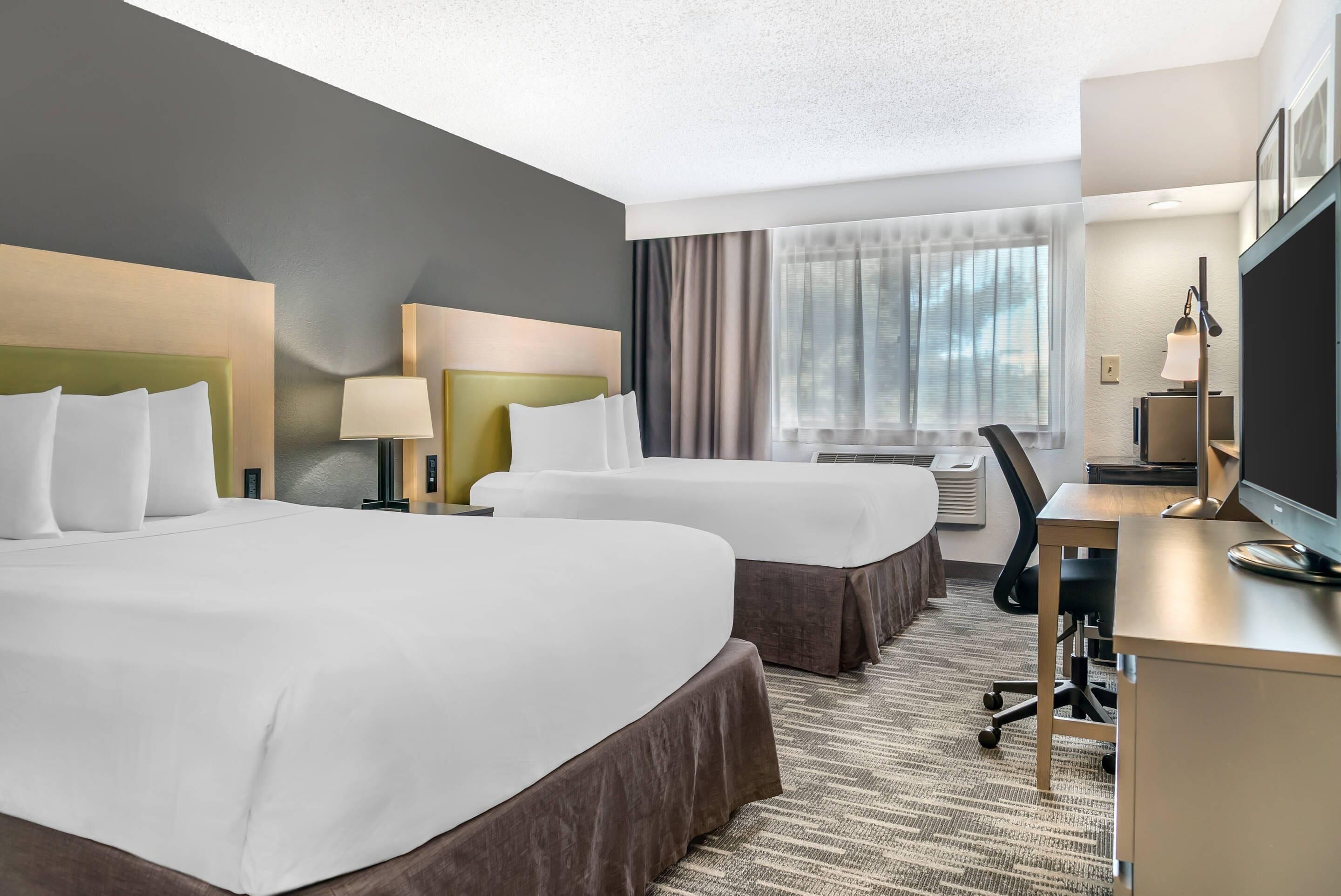 Room, 2 Queen Beds, Non Smoking | Premium bedding, down duvets, pillow-top beds, in-room safe