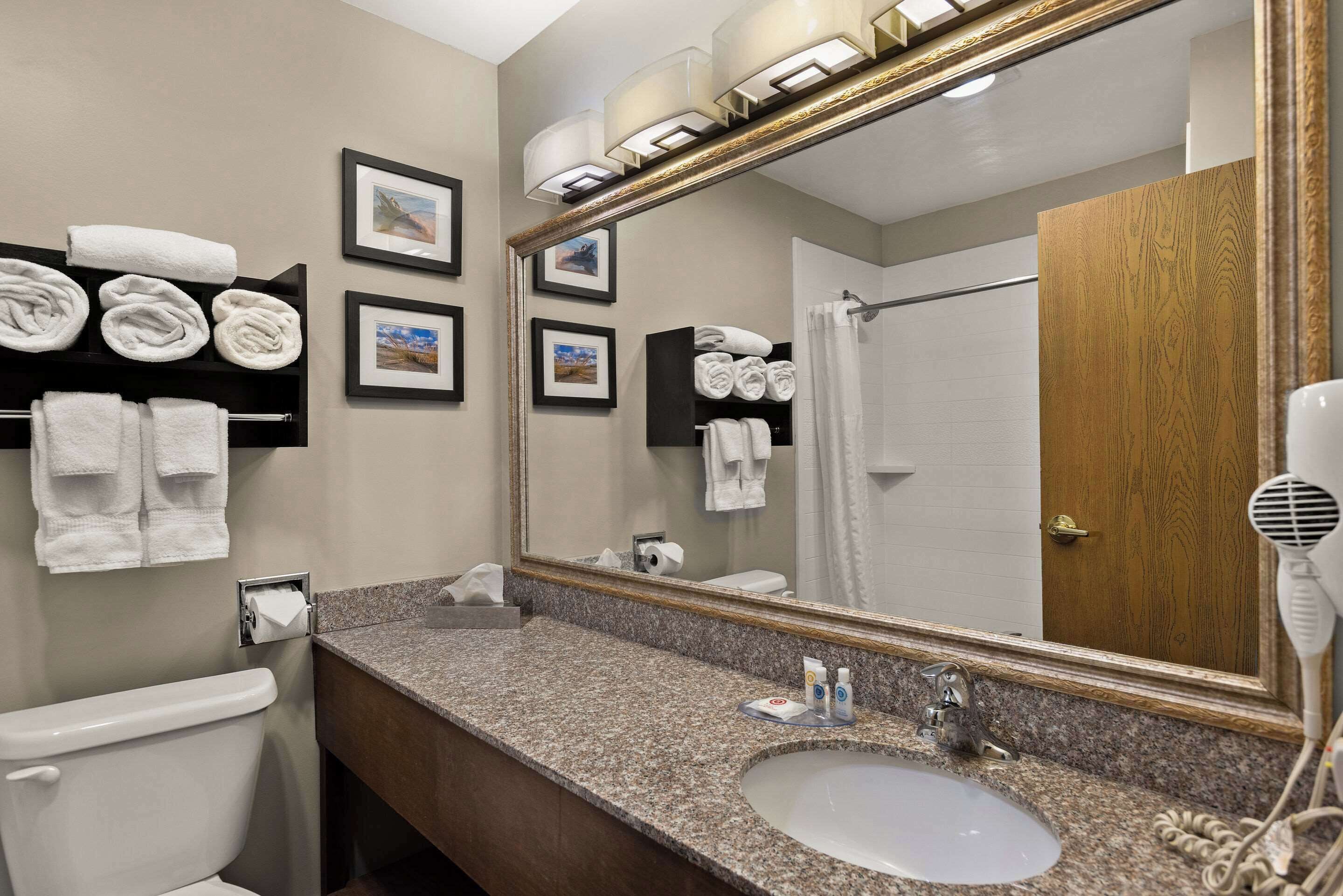 premium bedding, desk, laptop workspace, iron/ironing board