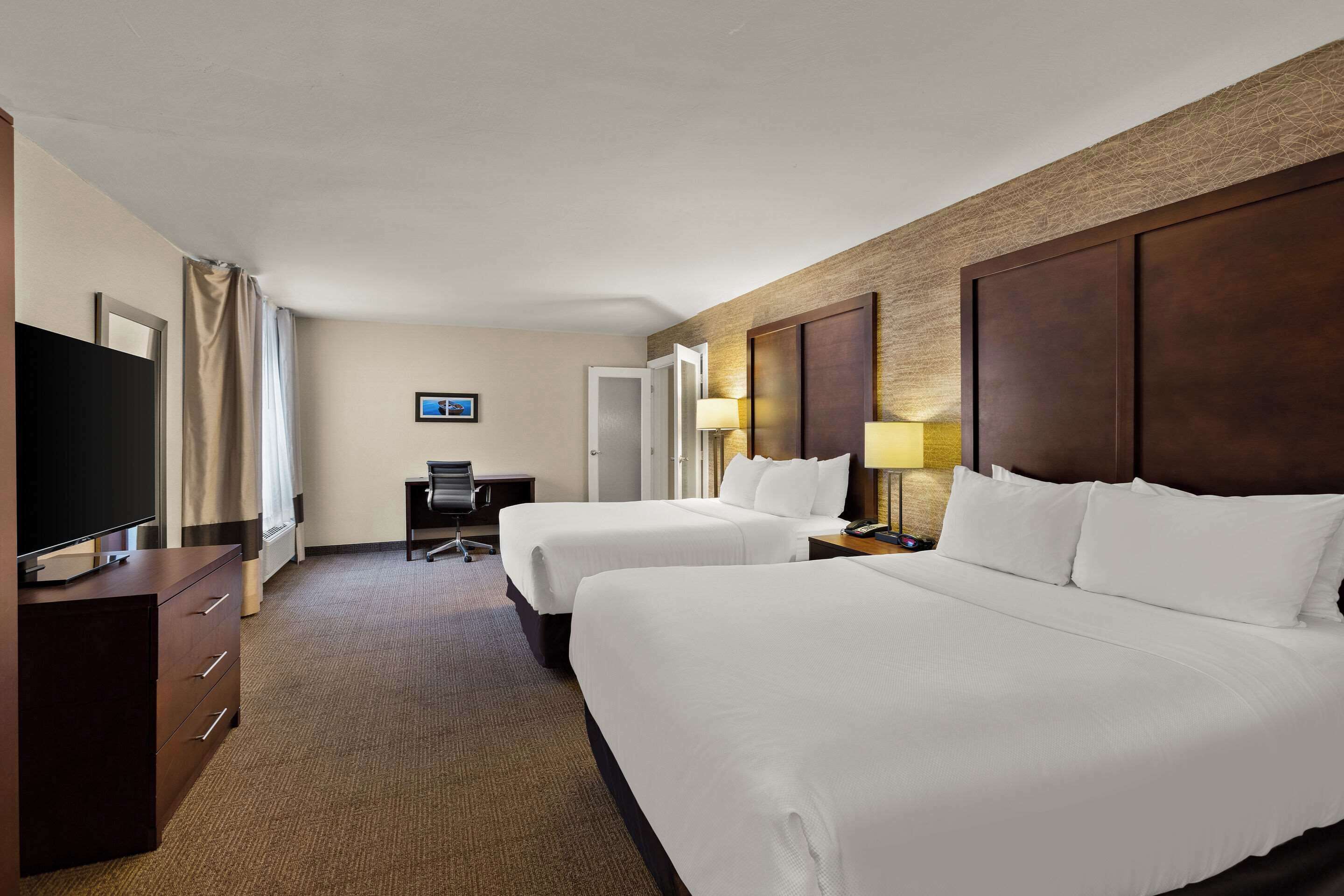 premium bedding, desk, laptop workspace, iron/ironing board